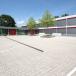 Grundschule mit Pausenhof nach der energetischen Sanierung (Quelle: Gemeinde Kürnach)